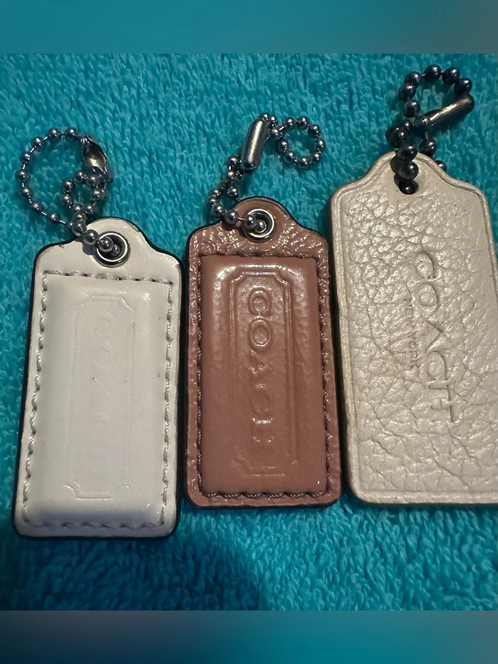 COACH Leather Key Tag Charm Trio - 2 White/Cream 1 Purple/Plum